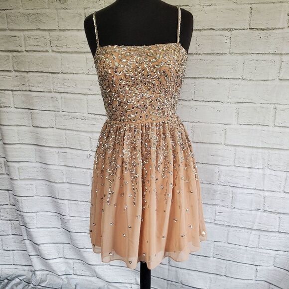 NBD Dresses & Skirts - X by NBD sequin spaghwtti strap mini dress